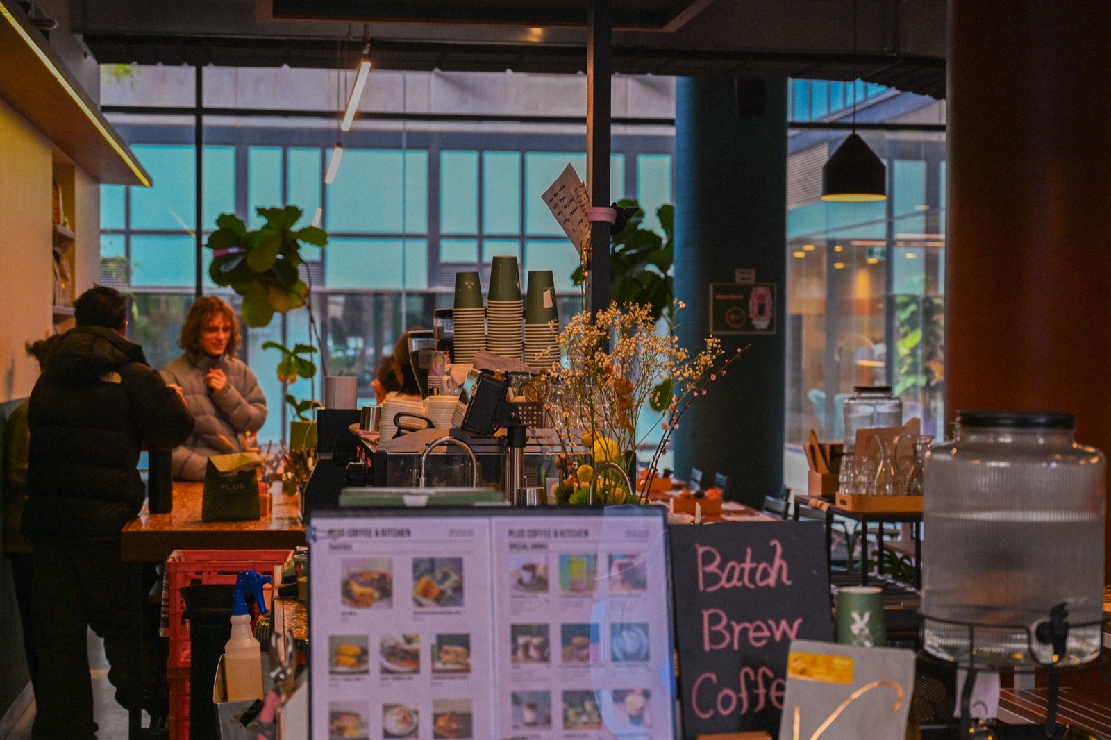 Group at a cafe table at the Yapify coffee chat, July 2026