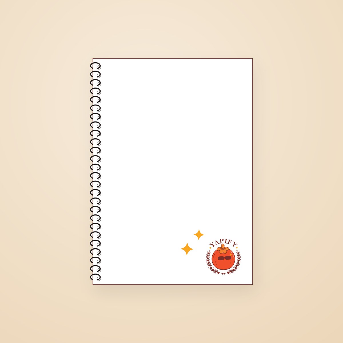Spiral-bound notebook — white cover with a small Yapify tomato emblem